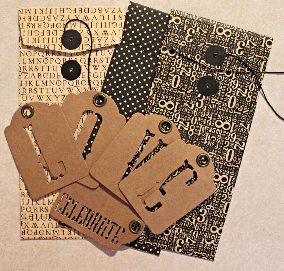Gather the envelops and letters from the Alpha Banner Kraft Set,