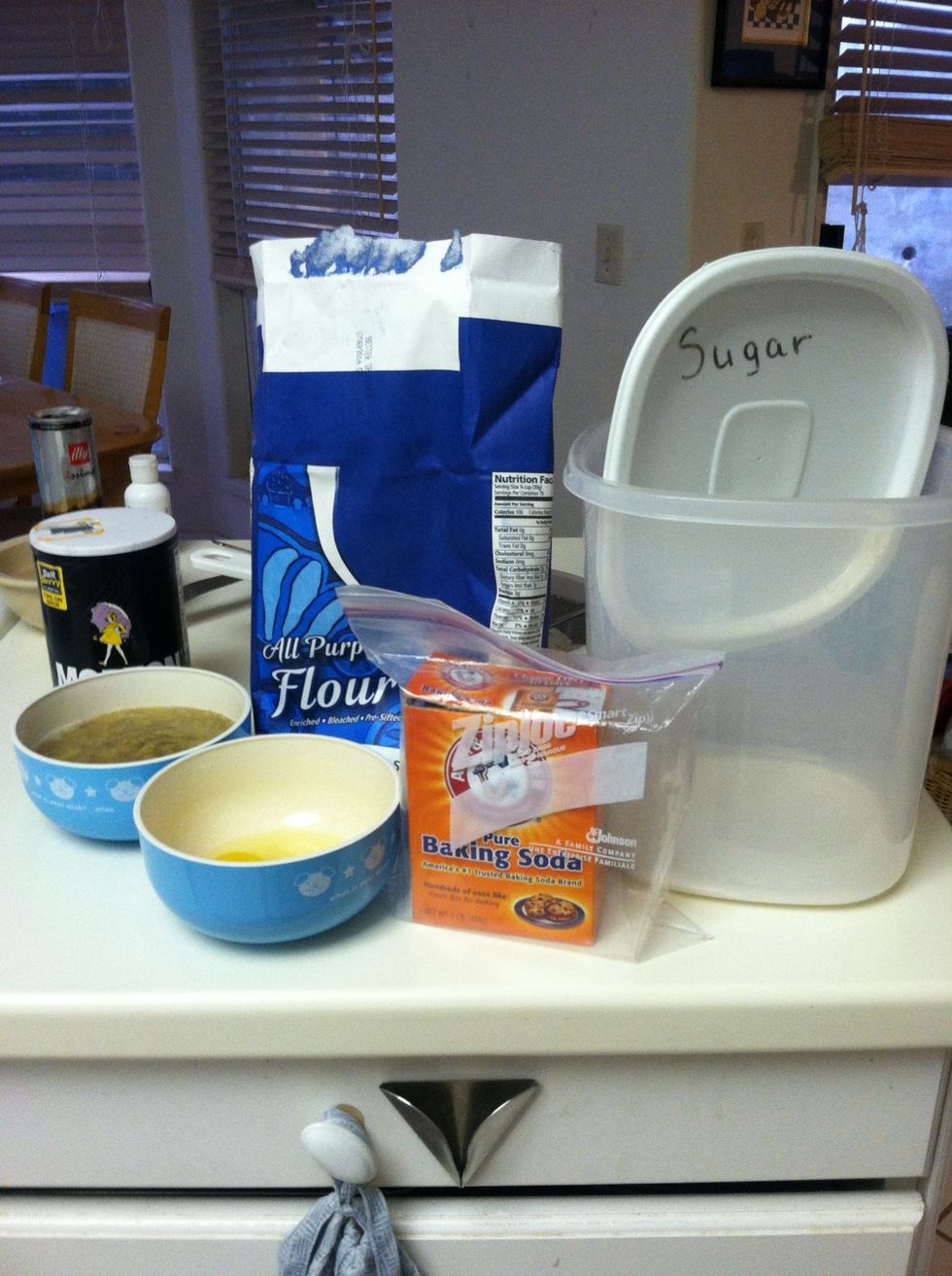 Gather the supplies listed: an oven, a mixer, one cup of sugar, one egg, one fourth teaspoon of salt, three fourths teaspoon of baking soda, overripe bananas and two tablespoons of orange juice.