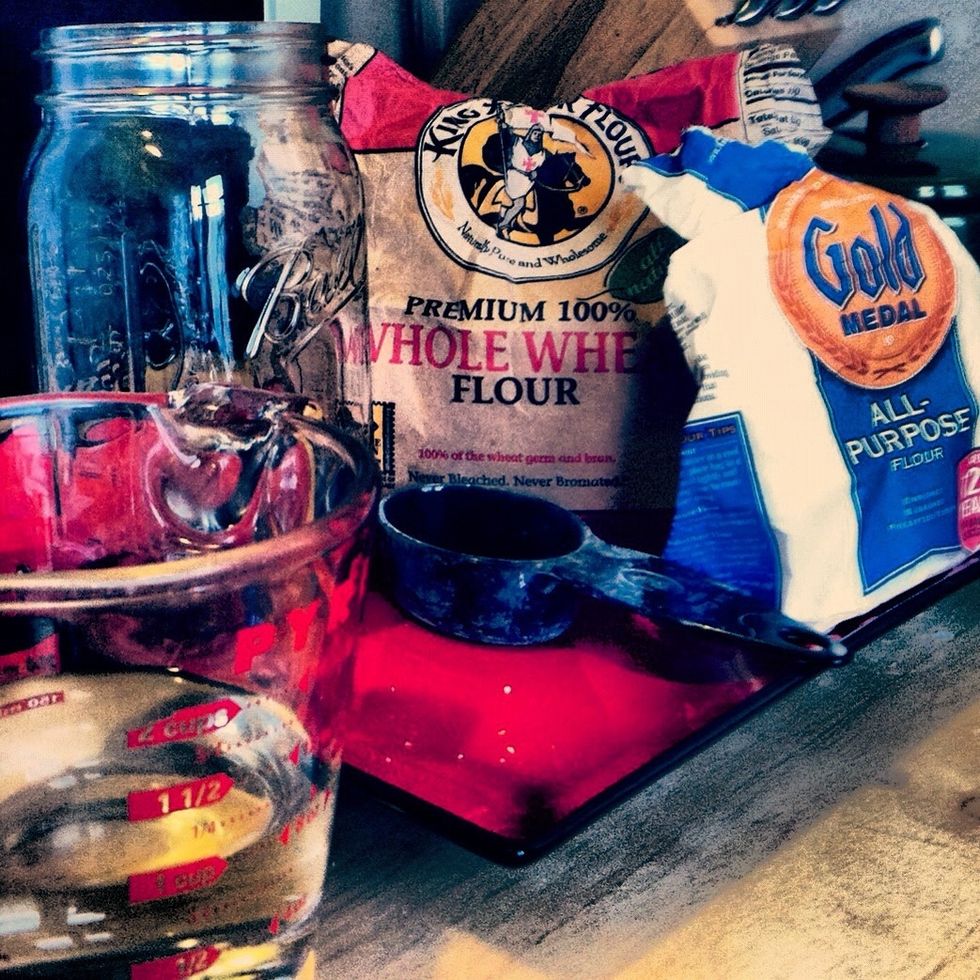 Gather together your ingredients. If you are lucky you won't have to go any further than your own pantry. Once you get into the bread making habit I assure you these things will always be on hand :-)