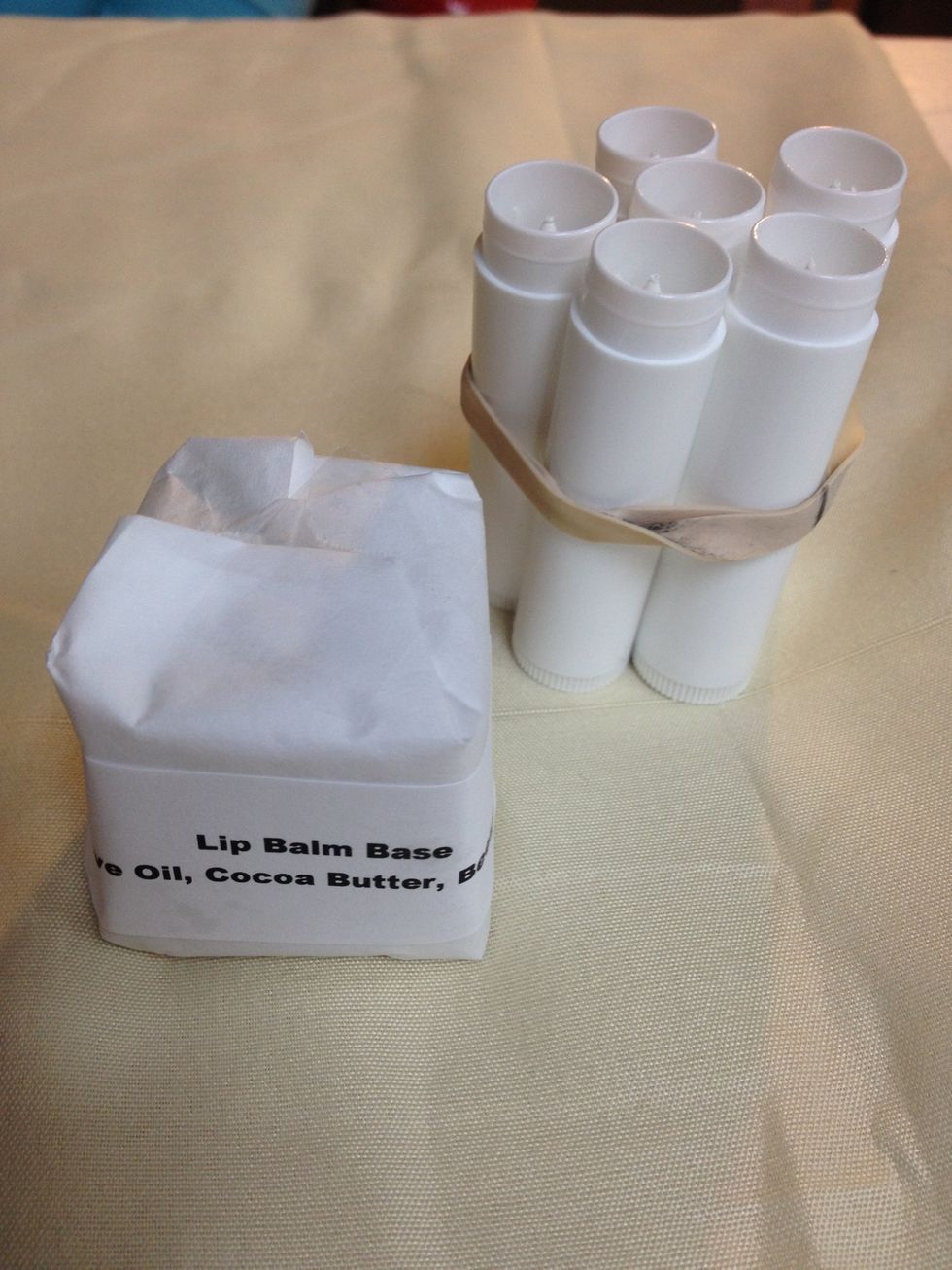 Gather tubes and wrap with elastic band so they remain upright together.