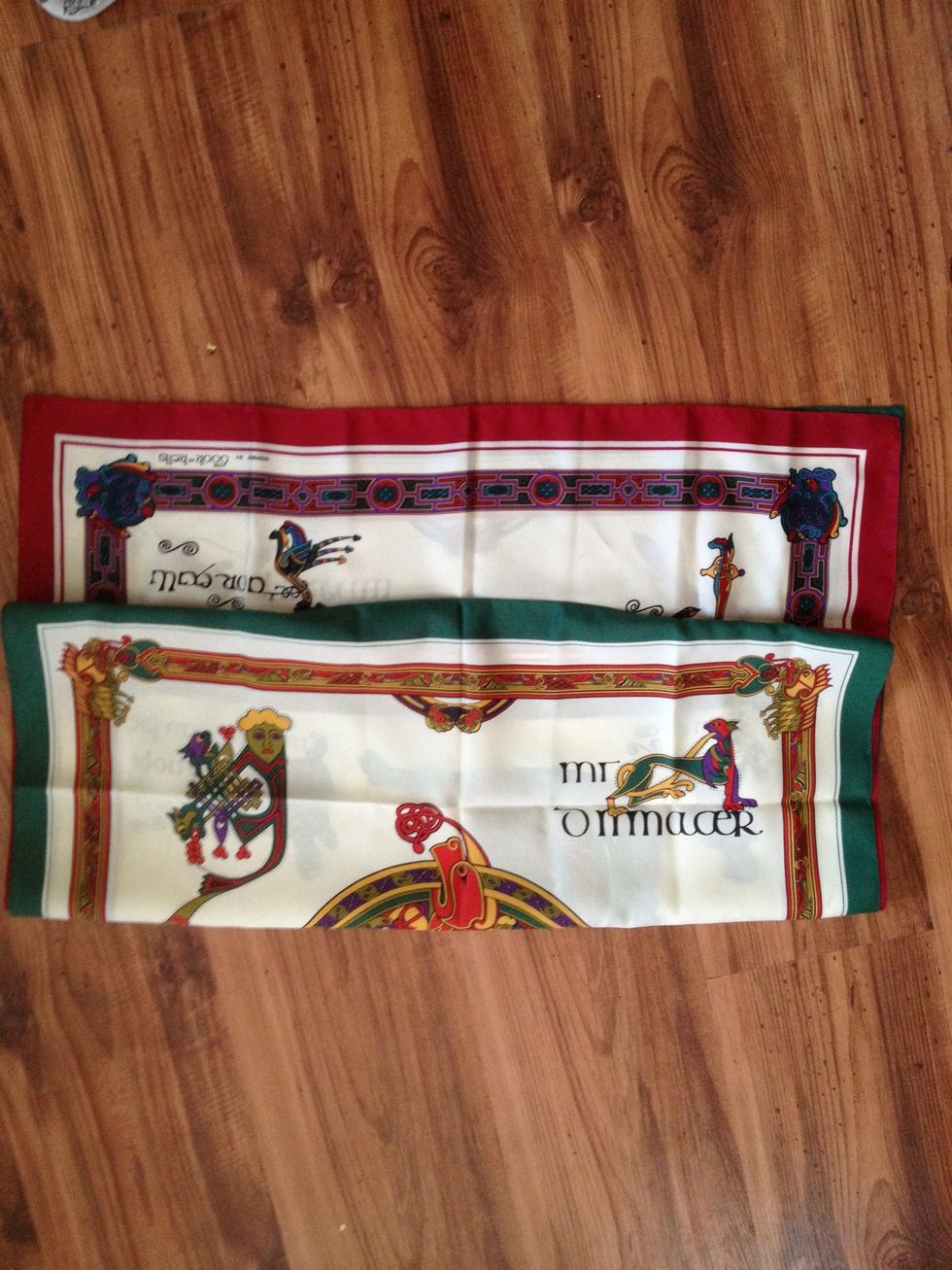 Gather two scarves making sure that they will be large enough to cover you and then some.