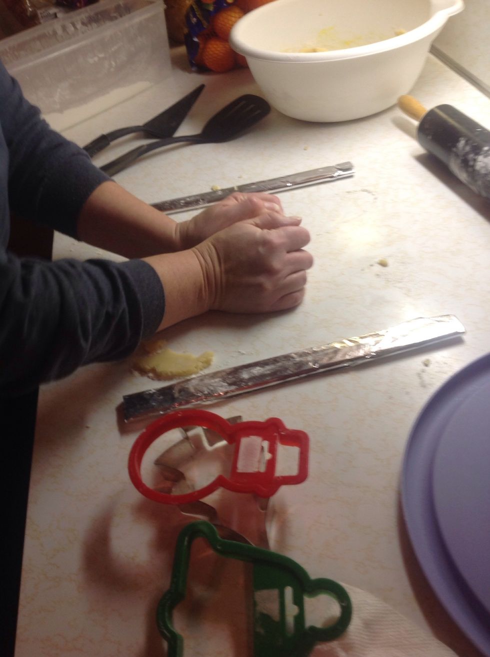 Gather up the leftover dough, and keep rolling it out, cutting it, and baking it until all the dough is used up.