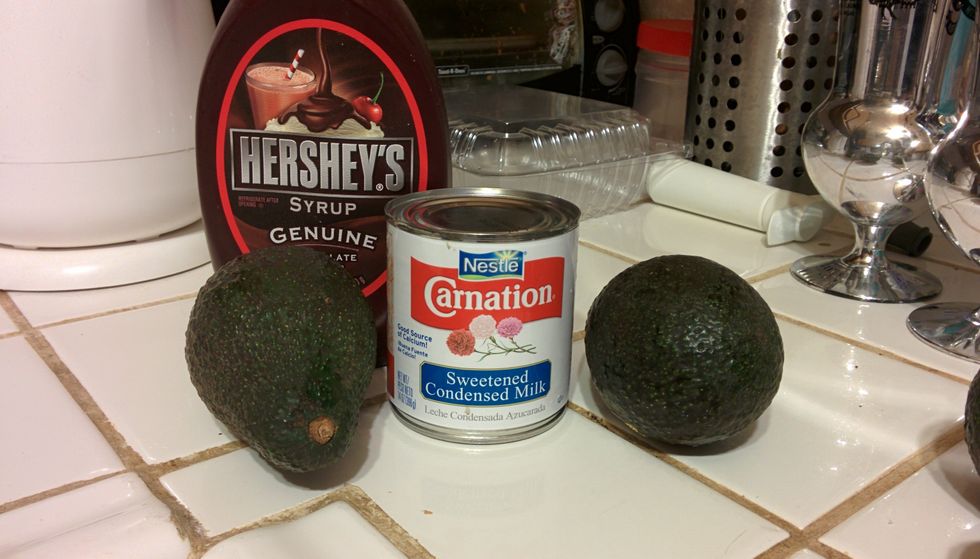Gather up the main ingredients. You also need some ice blocks and milk. Don't forget a blender, of course.
