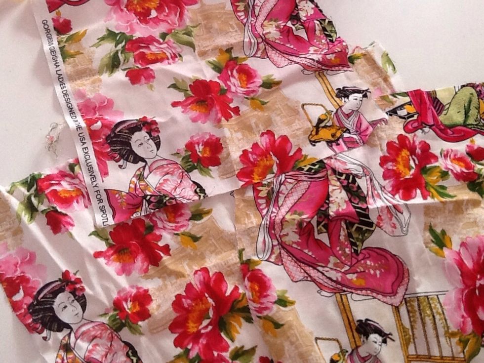 Gather up your fabric. You only need the smallest amount, so I'm just using some fabric I have left over from another project. Smaller patterns/designs on the fabric look the best.