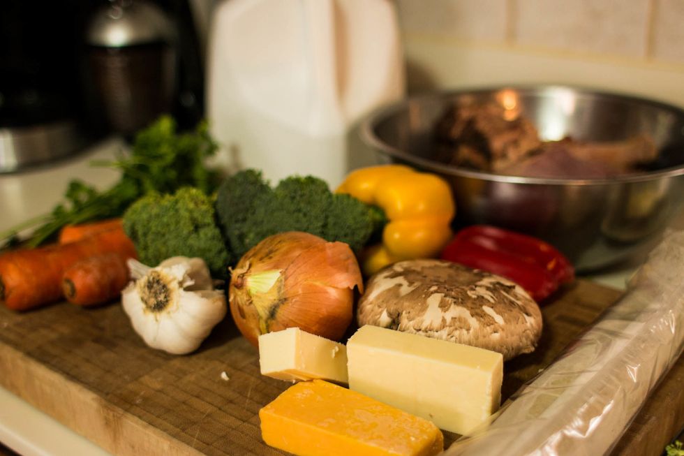 Gather up your ingredients and lay them all out on your cutting board, only to move them off of it again after you take a picture of them.