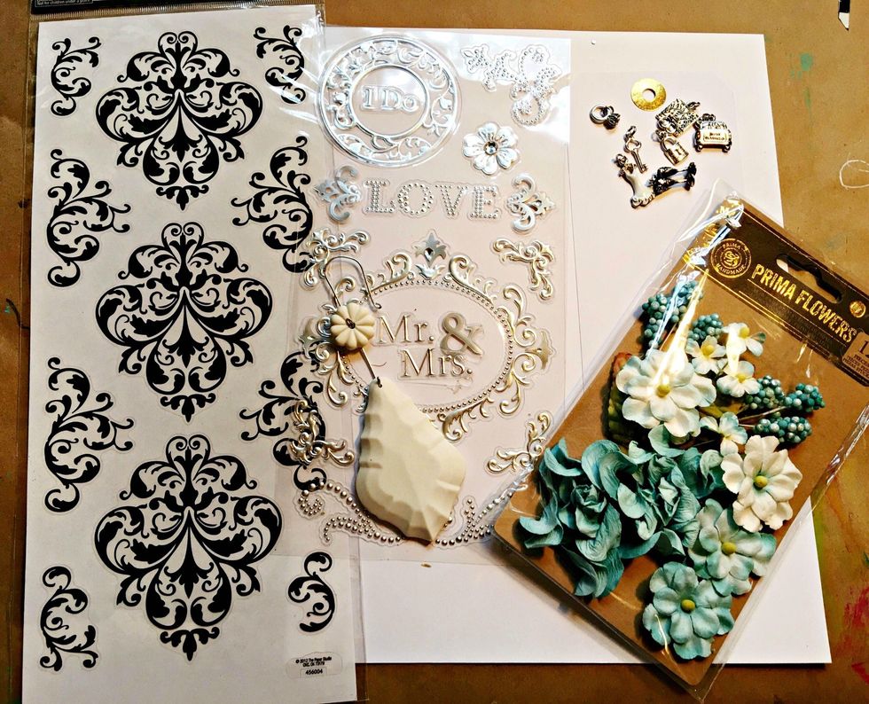 Gather up your supplies for your gift tag and pendant. I went with a black, white, teal, and silver theme.