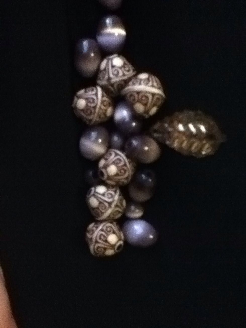 Gather your beads that you have and then pick a style or colour or even pattern. I've picked dark funky beads that I have decided to put all in a pattern. (You can get beads from any arty stores