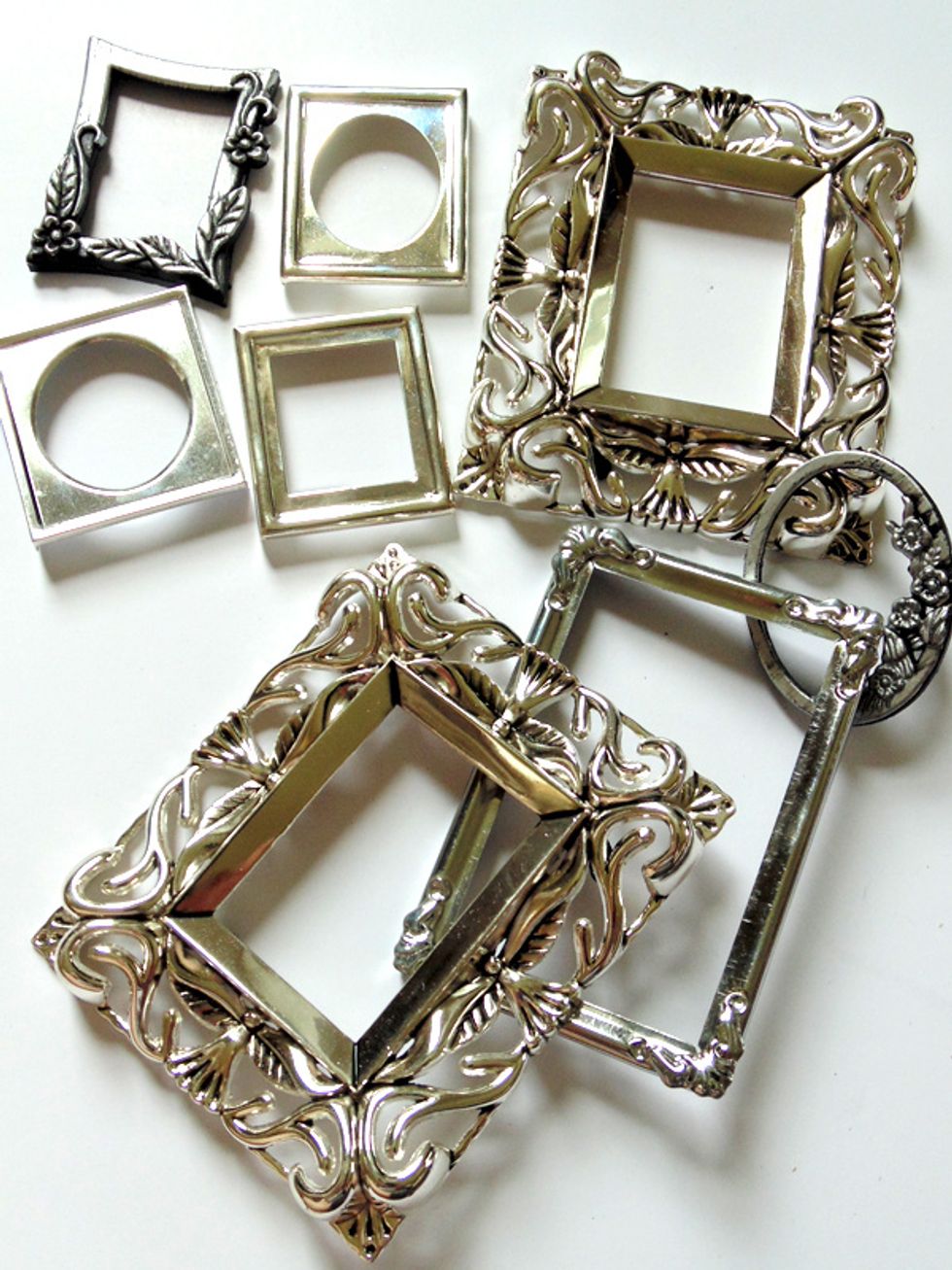 Gather your frames and remove the glass and backings. Clean them well and sand them lightly if you like.