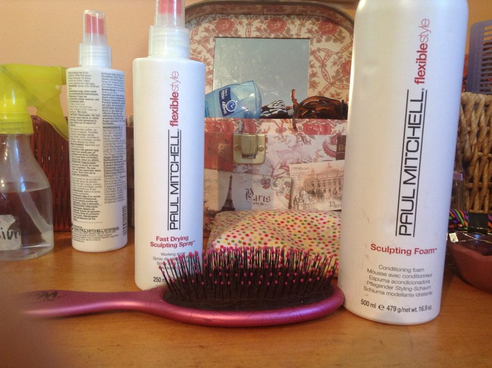 Gather your hair products. I use the Wet Brush, and Paul Mitchell products such as the Fast Drying Sculpting Spray and the Sculpting Foam.