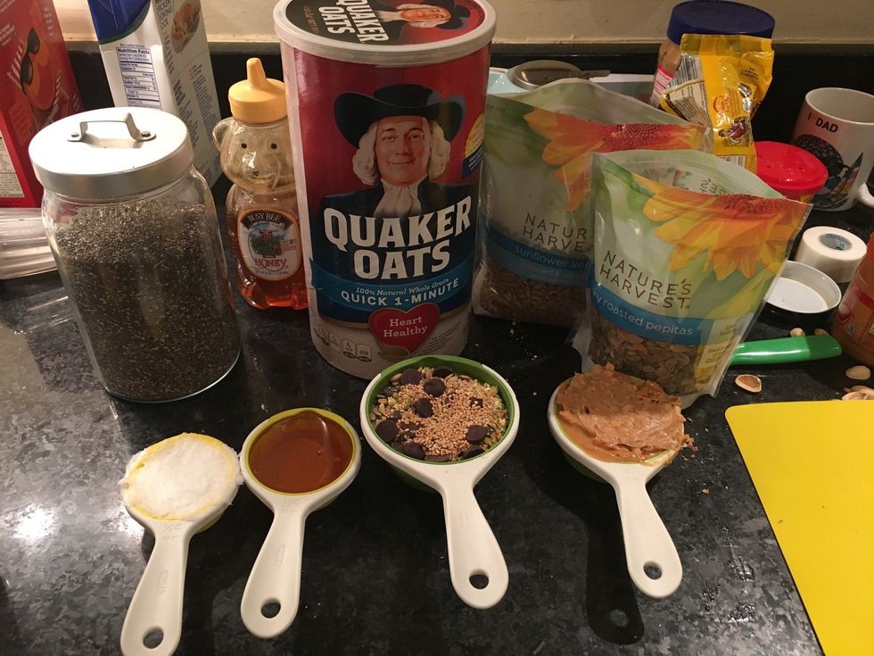 Gather your ingredients: 1/4 cup coconut oil (or oil of choice), 1/3 cup honey, 1/2 cup nut butter (I used half almond half peanut), 1 cup oats, and 1 cup of mixture of nuts, seeds, & chocolate chips