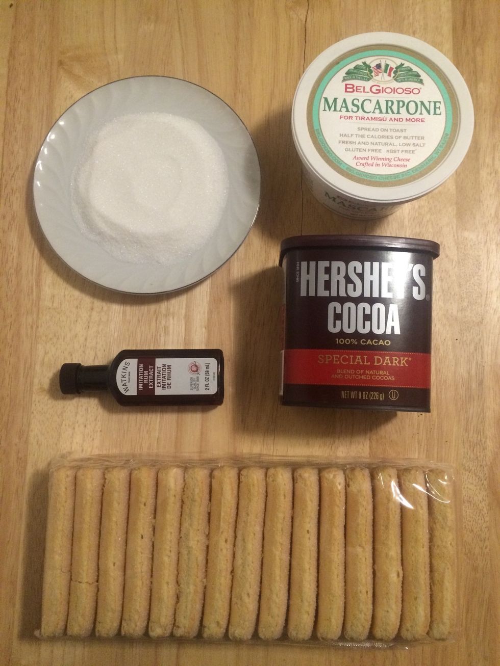 Gather your ingredients. Any cocoa powder will do, and if you don't have rum extract, you can substitute it for vanilla extract.