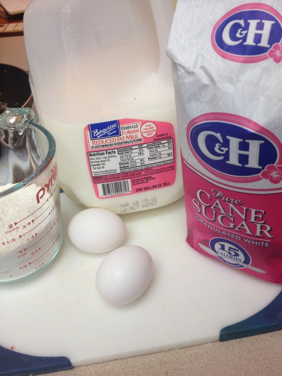 Gather your ingredients for the batter: 2eggs, milk, flour, and sugar
