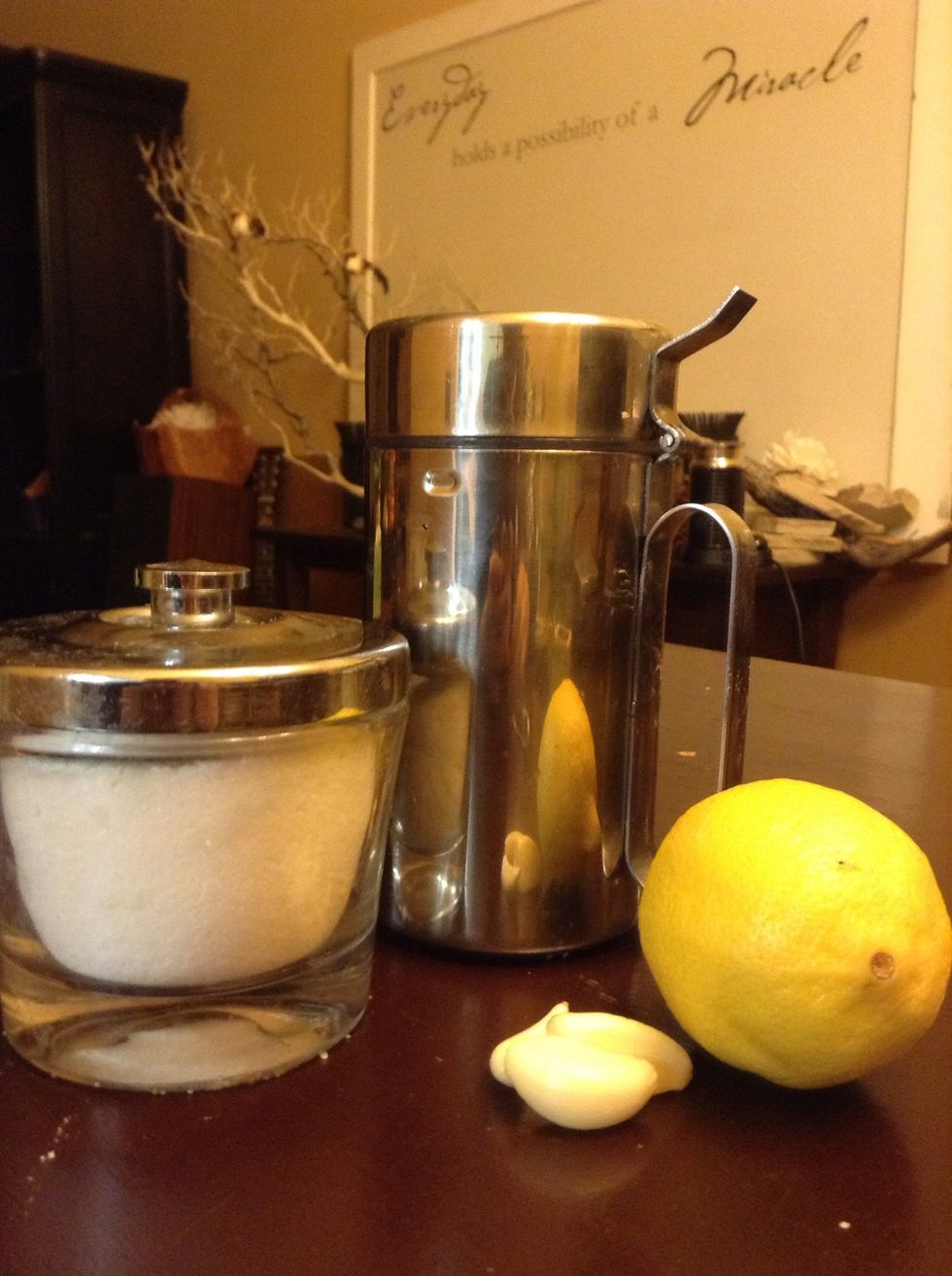 Gather your ingredients. Lemon, Salt, Garlic, and Olive oil