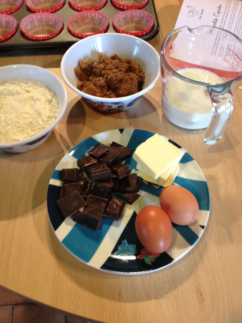 Gather your ingredients, mixing the flour and raising agents, and combining the milk and vanilla extract.