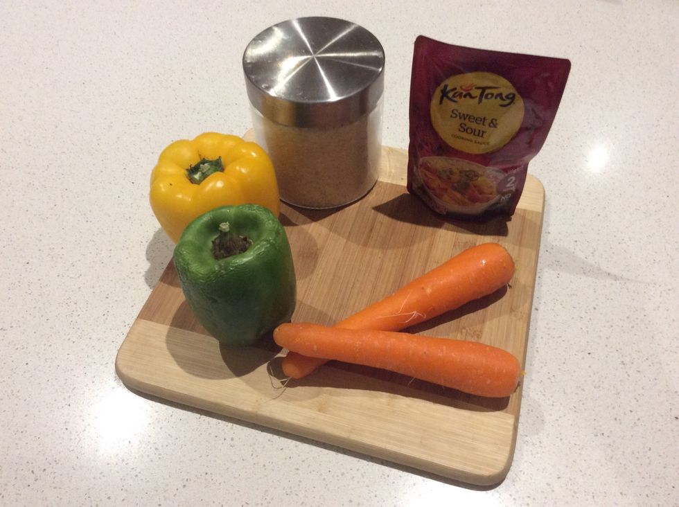 Gather your ingredients such as: Carrots ( 1 is sufficient ), Capsicum ( 2 different capsicums is sufficient ), Sweet & Sour cooking sauce and Extra Virgin Oil and Long Grain White Rice.