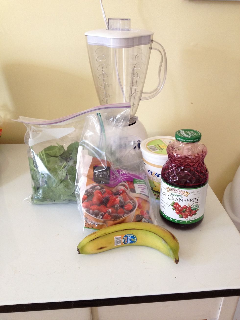 Gather your ingredients up! I don't give measurements seeing that they're are not really required but it's about 1 cup of berries to 1/2 cup yogurt and juice.