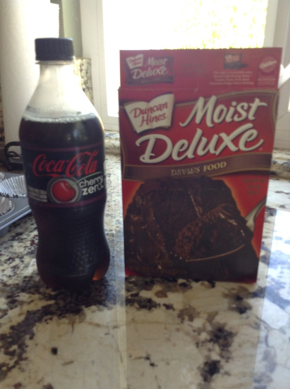 Gather your ingredients. You can use any kind of box cake mix and soda. I just happened to use devils food cake and coke cherry zero