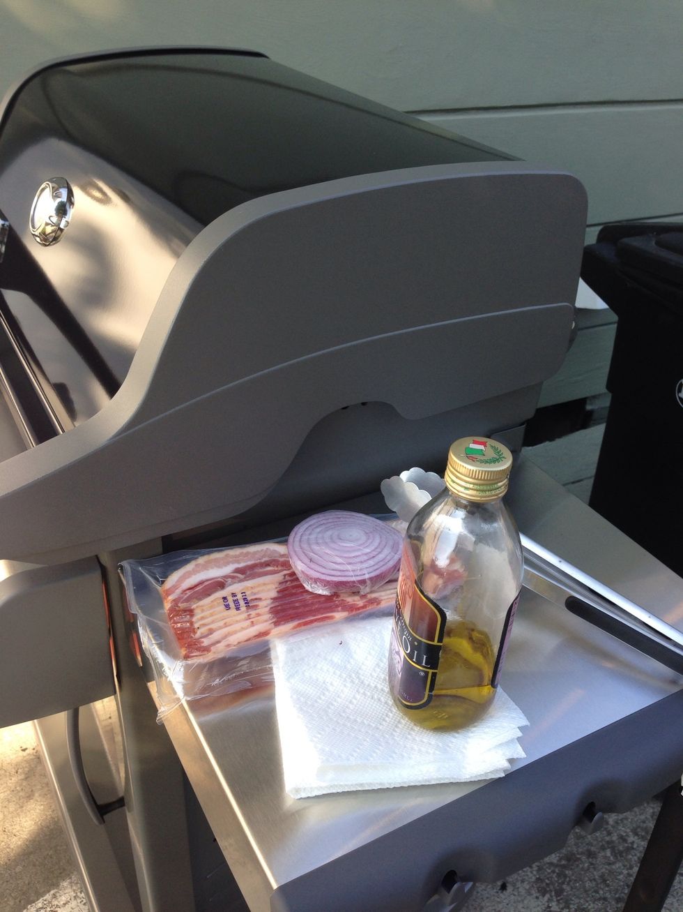 Gather your materials. Before you cook on your grill the first time, I would recommend wrapping the drip tray and tin with tin foil. It keeps the grill nicer for longer.