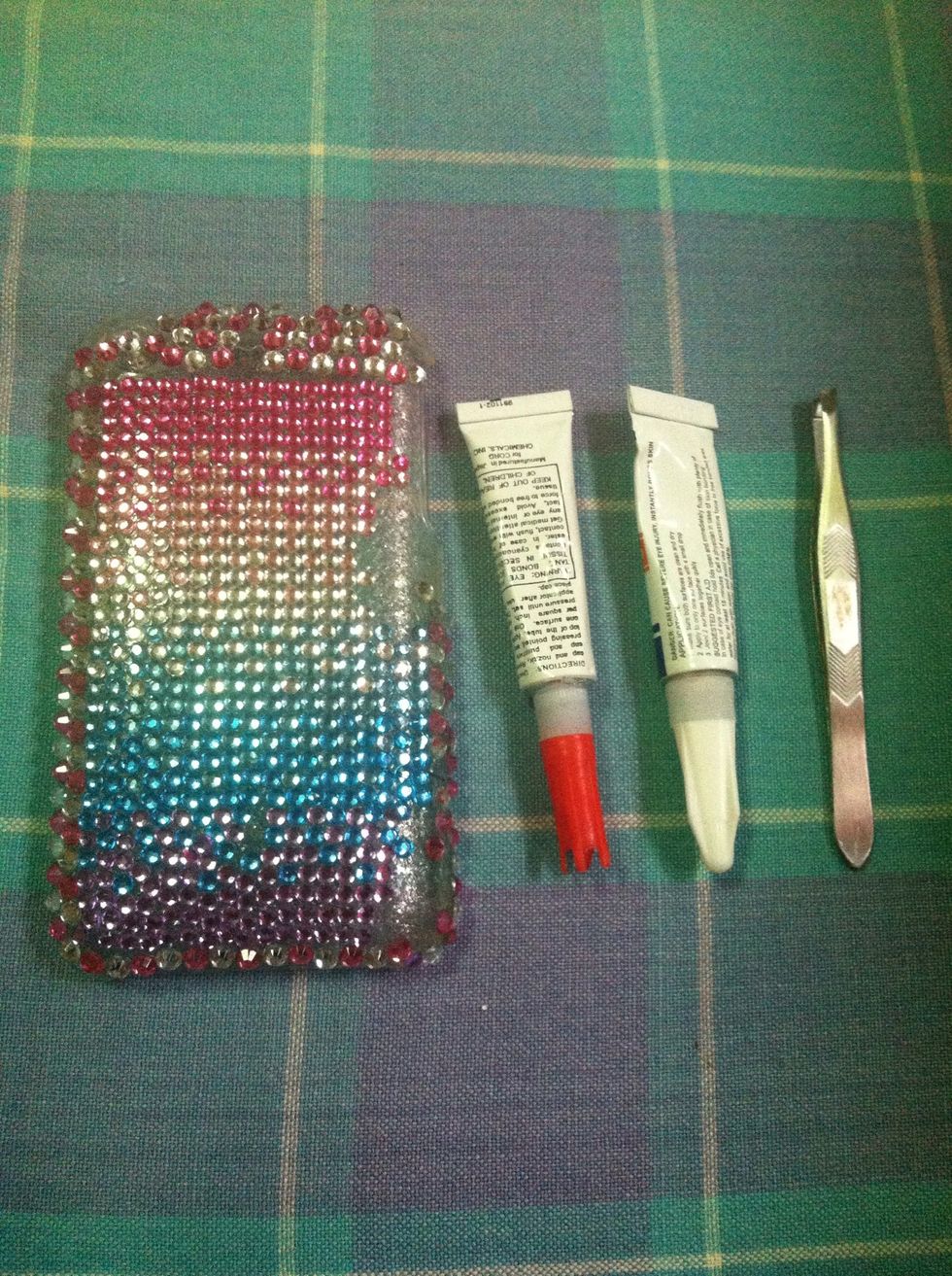 Gather your materials (Old iPhone case, super glue and tweezers)