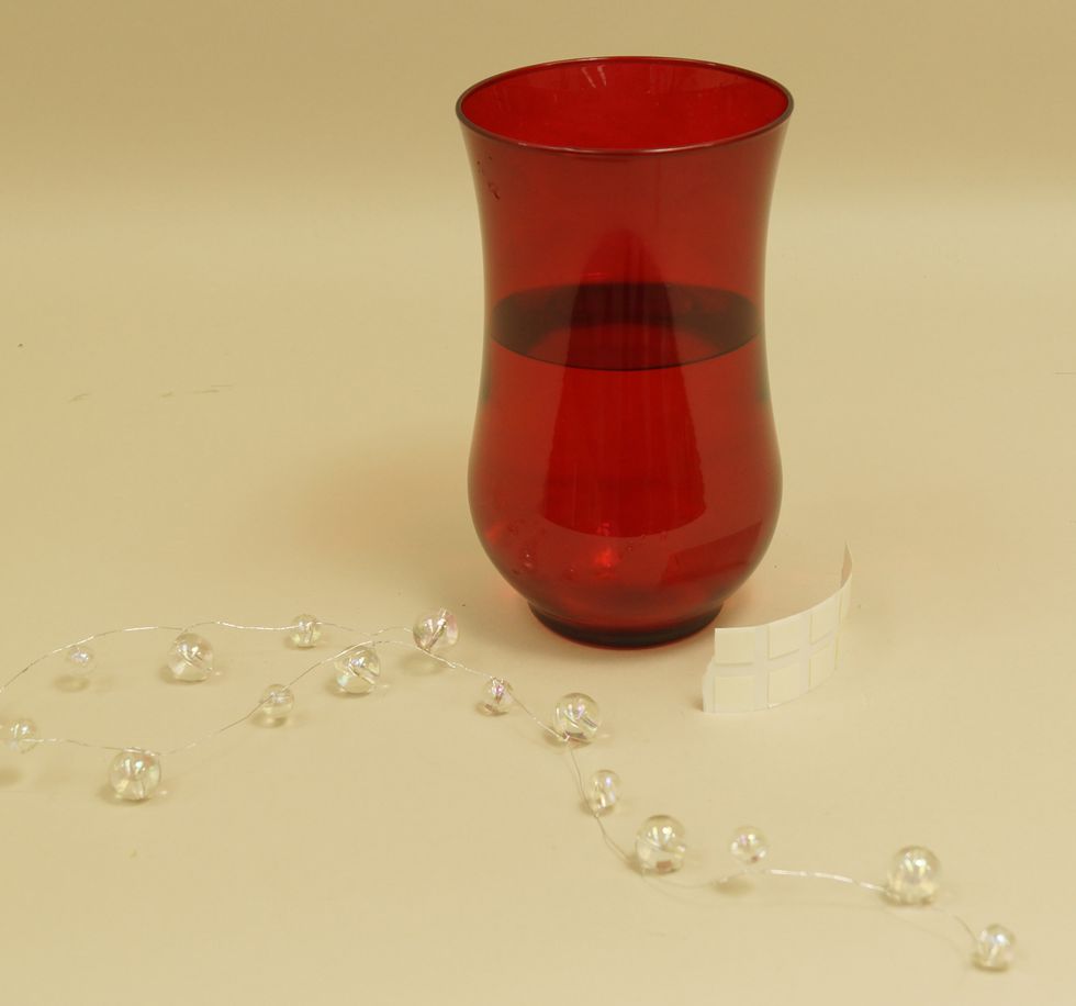 Gather your supplies and fill vase with water.