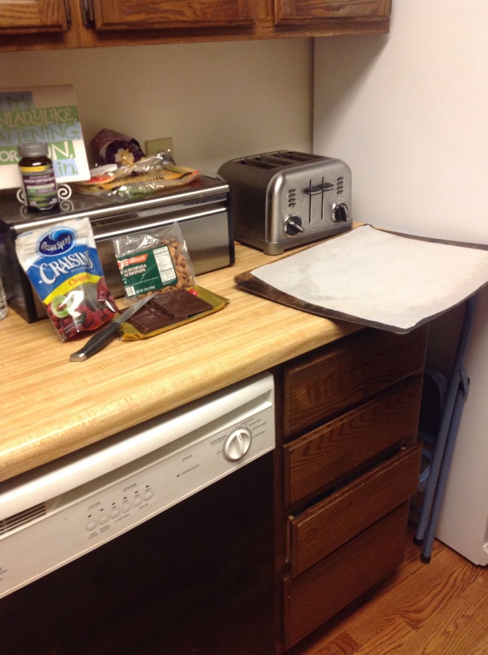 Gather your supplies Dried fruit, dark chocolate, and any healthy nut to your liking