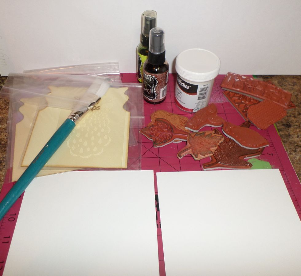 Gather your supplies. I got out 2 cold press blocks, gesso, Sincity Stamps Stamp Sets, Spray Inks and stamp pads.
