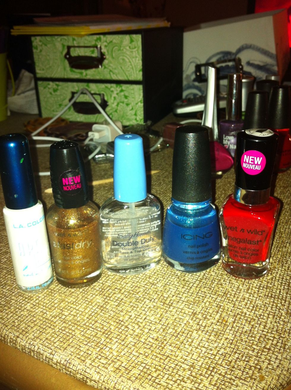 Gather your supplies. I'm using a variety of different brands including L.A. Colors (white) Wet n' Wild (gold & red), Icing (blue), & Sally Hanson (base coat).