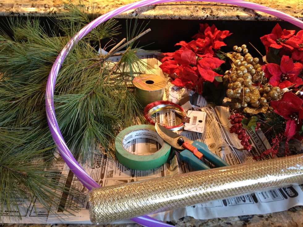 Gather your supplies. Line your work surface to catch the cuttings.