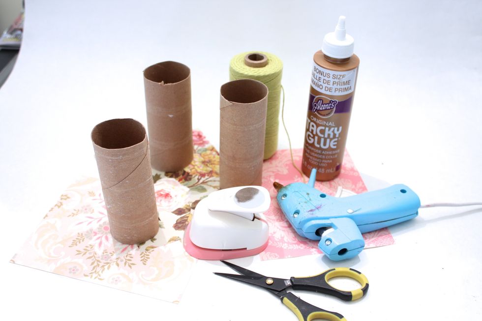 Gather your supplies. Petaloo Flowers are available online at most major scrapbook retailers. Start by trimming your paper 6 inch by 5 inch