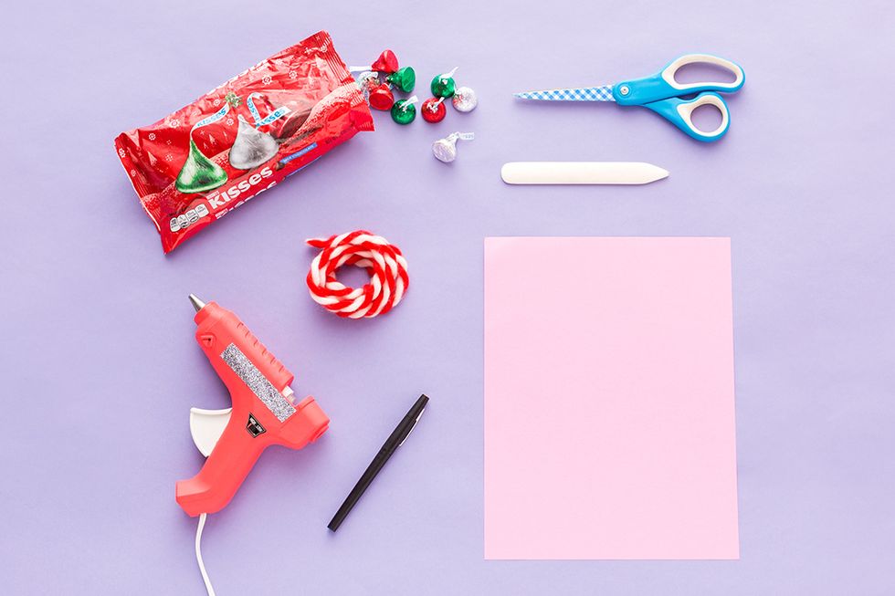 Gather your supplies. Use this HERSHEY\u2019S KISSES Holly Garland to hold your holiday cards and display them on a mantel or doorway!