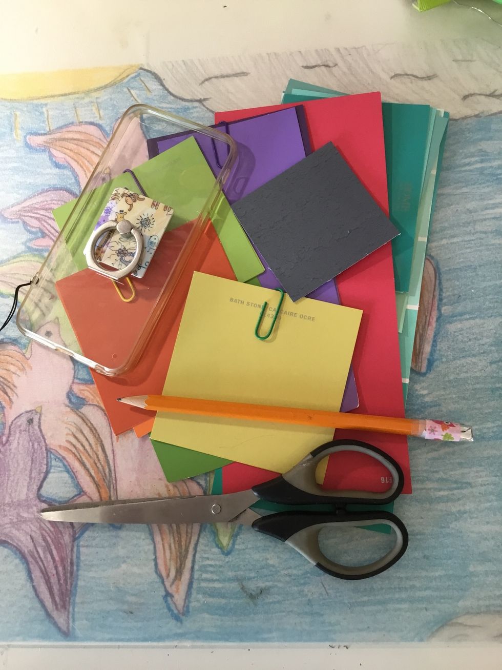 Gather your supplies. You need a clear phone case for this DIY.