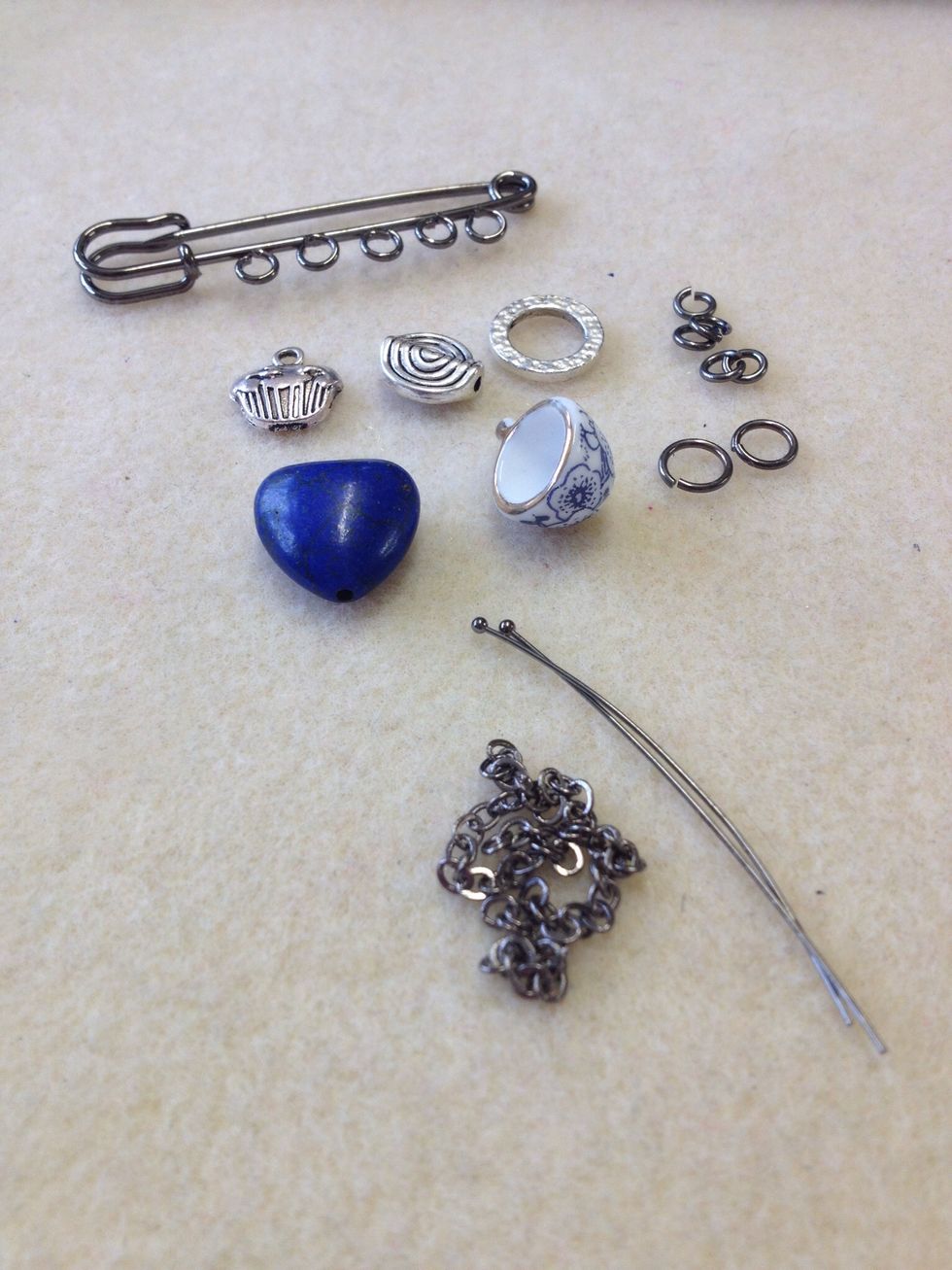 Gather your supplies; you will need chain nose and round nose pliers