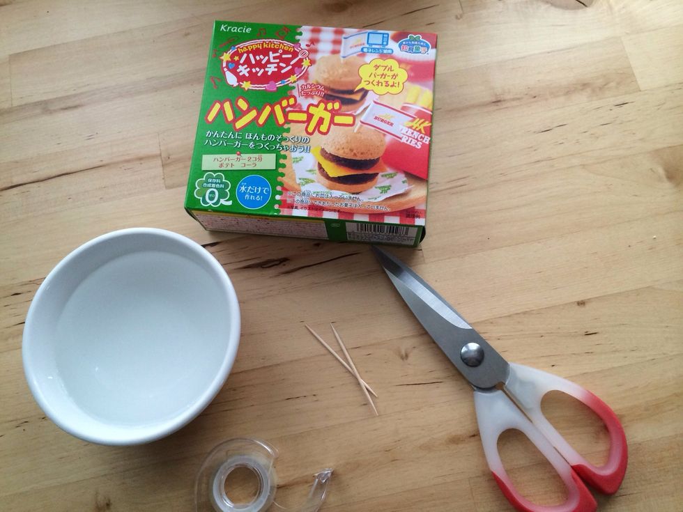 Gather your supplies-You will need:Water, Tape, 2 Toothpicks and Scissors and make sure you have a microwave nearby before you start the Hamburger Popin Cookin DIY Kit-Open box and DO NOT RIP Package!