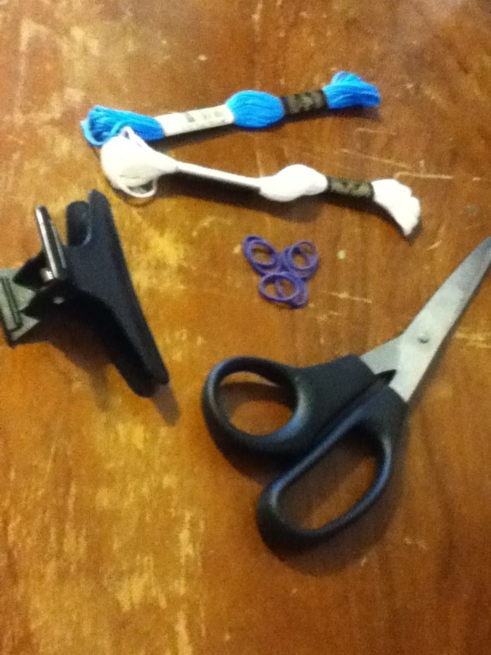 Gather your supplies! Your thread can be any color (obviously) but you want it to be thicker than regular sewing thread. Your hair bands need to be small and rubber too.