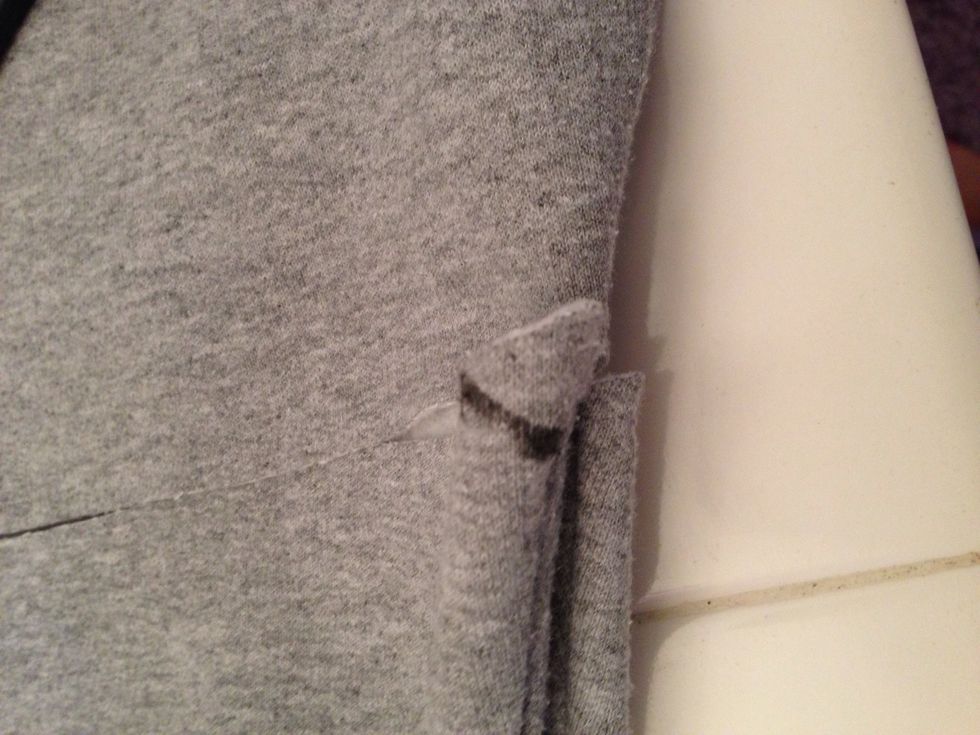 Gather your sweats. Make a mark for how long you want them, keep an eye on where the pocket is! Don't cut it off!