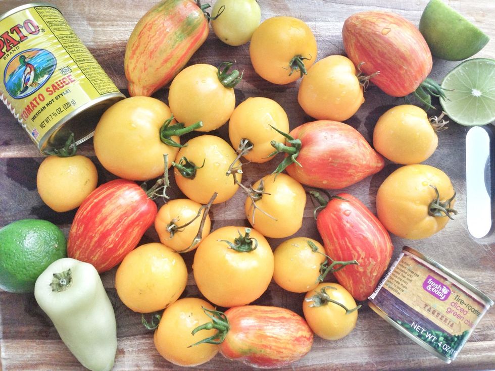 Gather your tomatoes together on a cutting board and inspect for any bad bits. Use a sharp knife to remove the stems and chop into 1/4 to 1/2 inch cubes. Set aside.