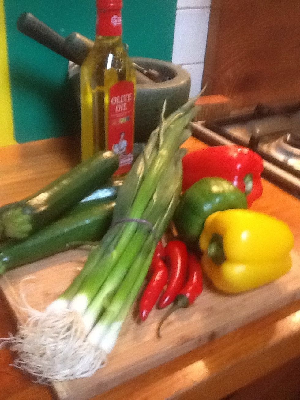 Gather your vegetables. Turn the grill to its maximum setting.