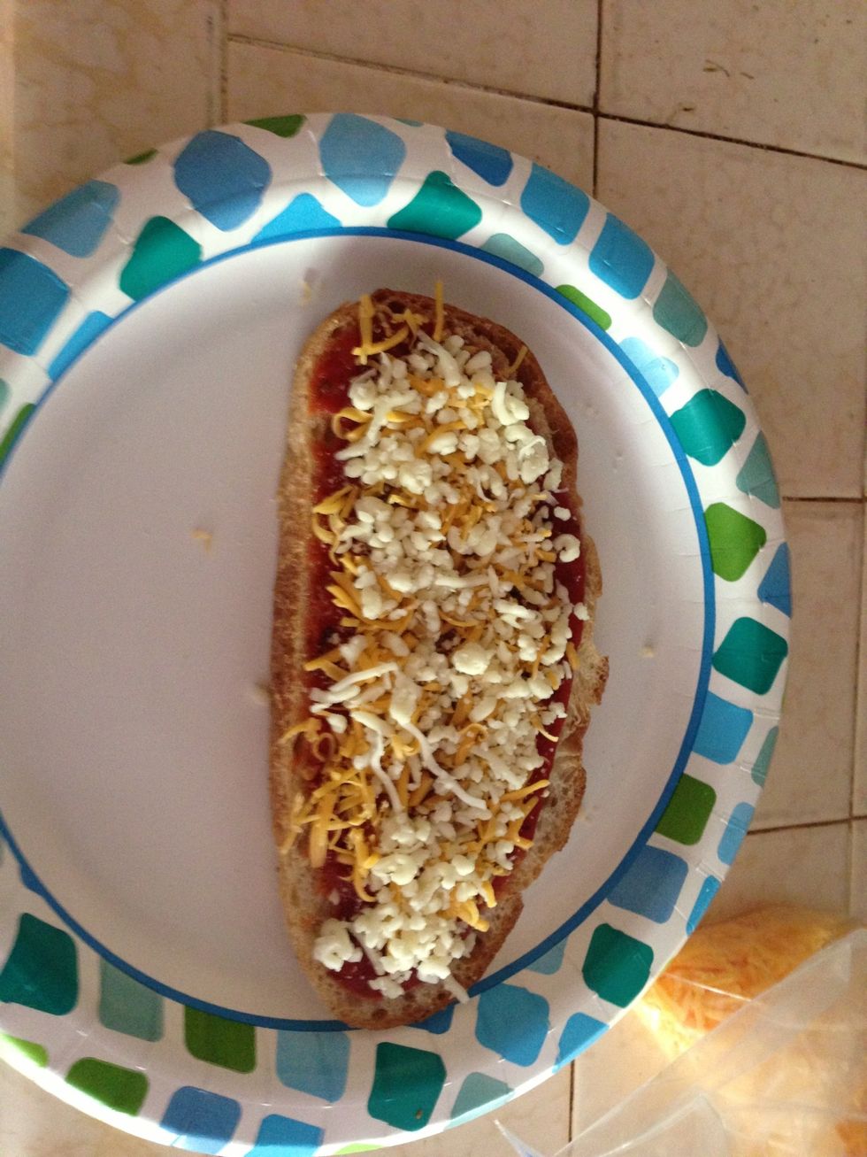 Generously add shredded cheese! I use mozzarella & cheddar!