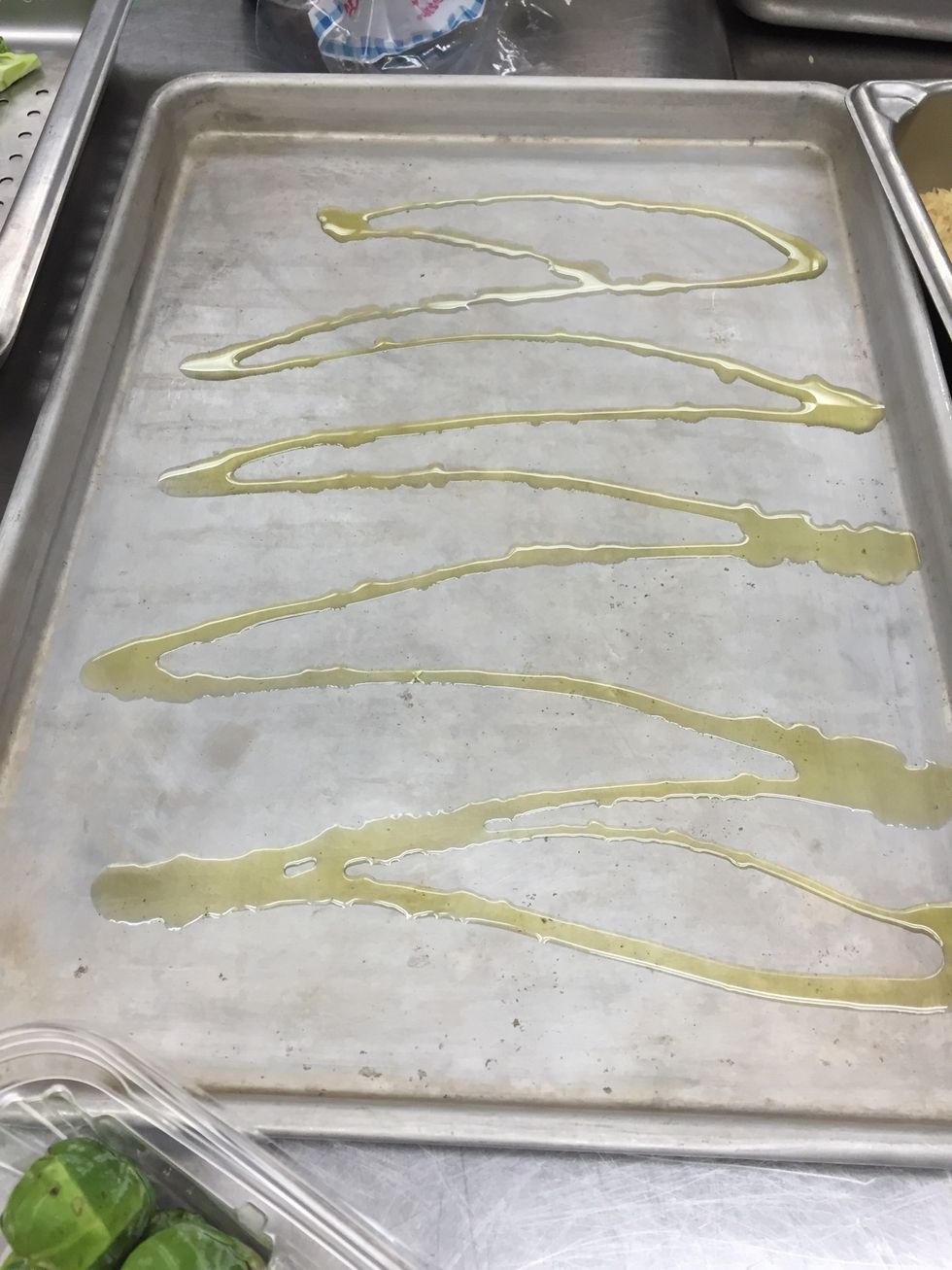 Generously coat sheet tray with olive oil.