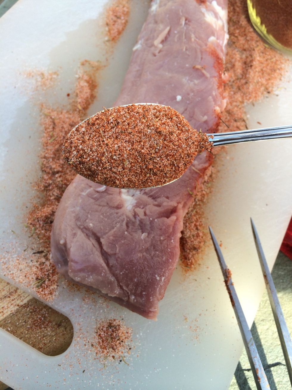 Generously coat the loin with the dry smoked paprika rub.