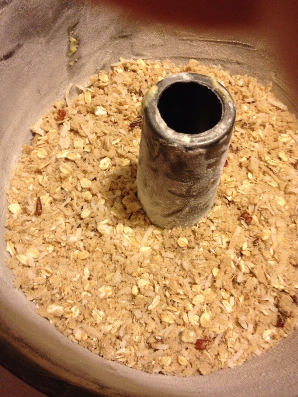 Generously spread a layer of the oat mixture on top of the batter.