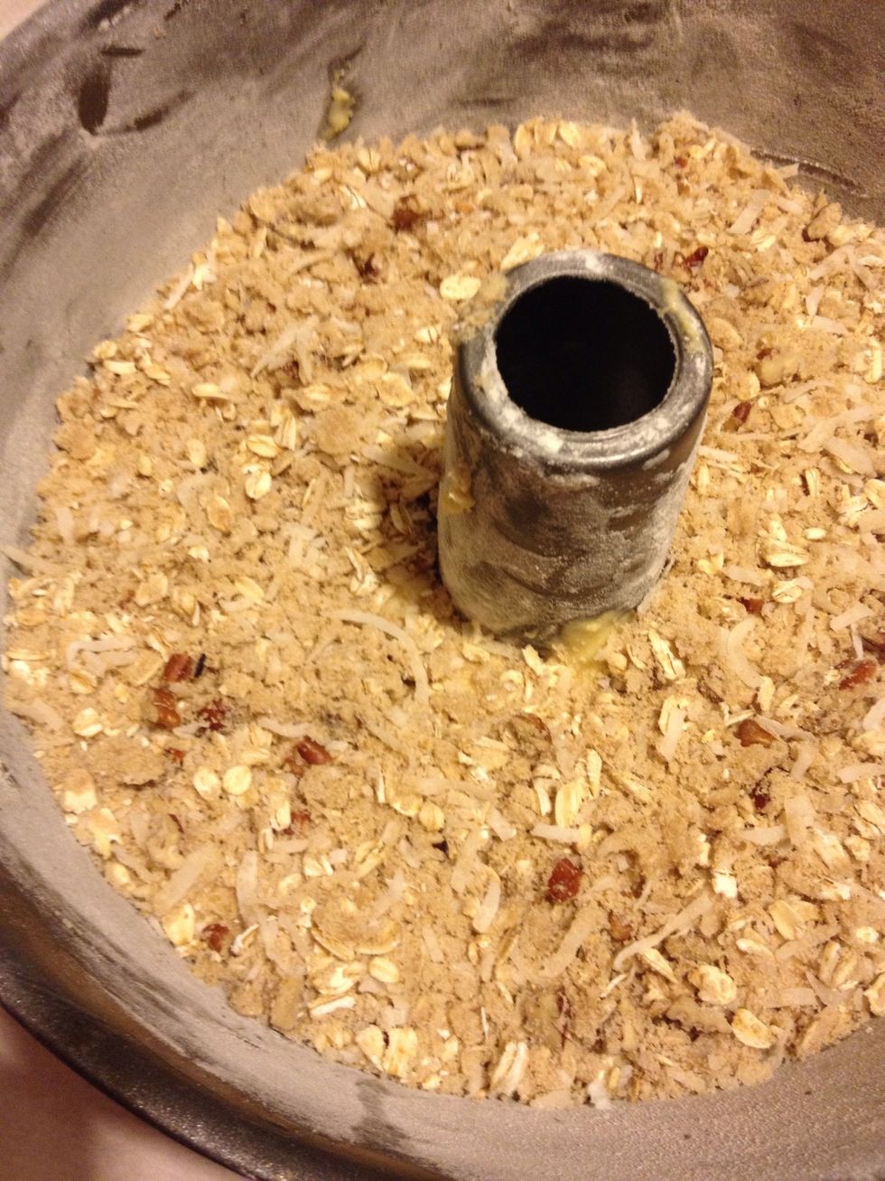 Generously spread the oat mixture over the second layer of batter.