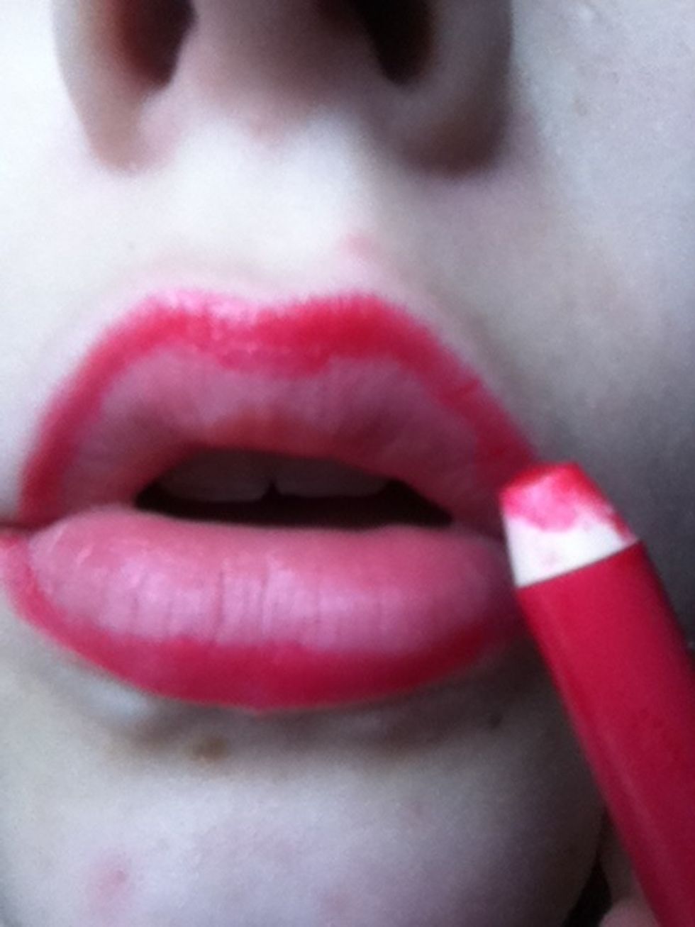 Gently draw on the edge of your lips, using small strokes. (sorry for the state of the pencil) :P x