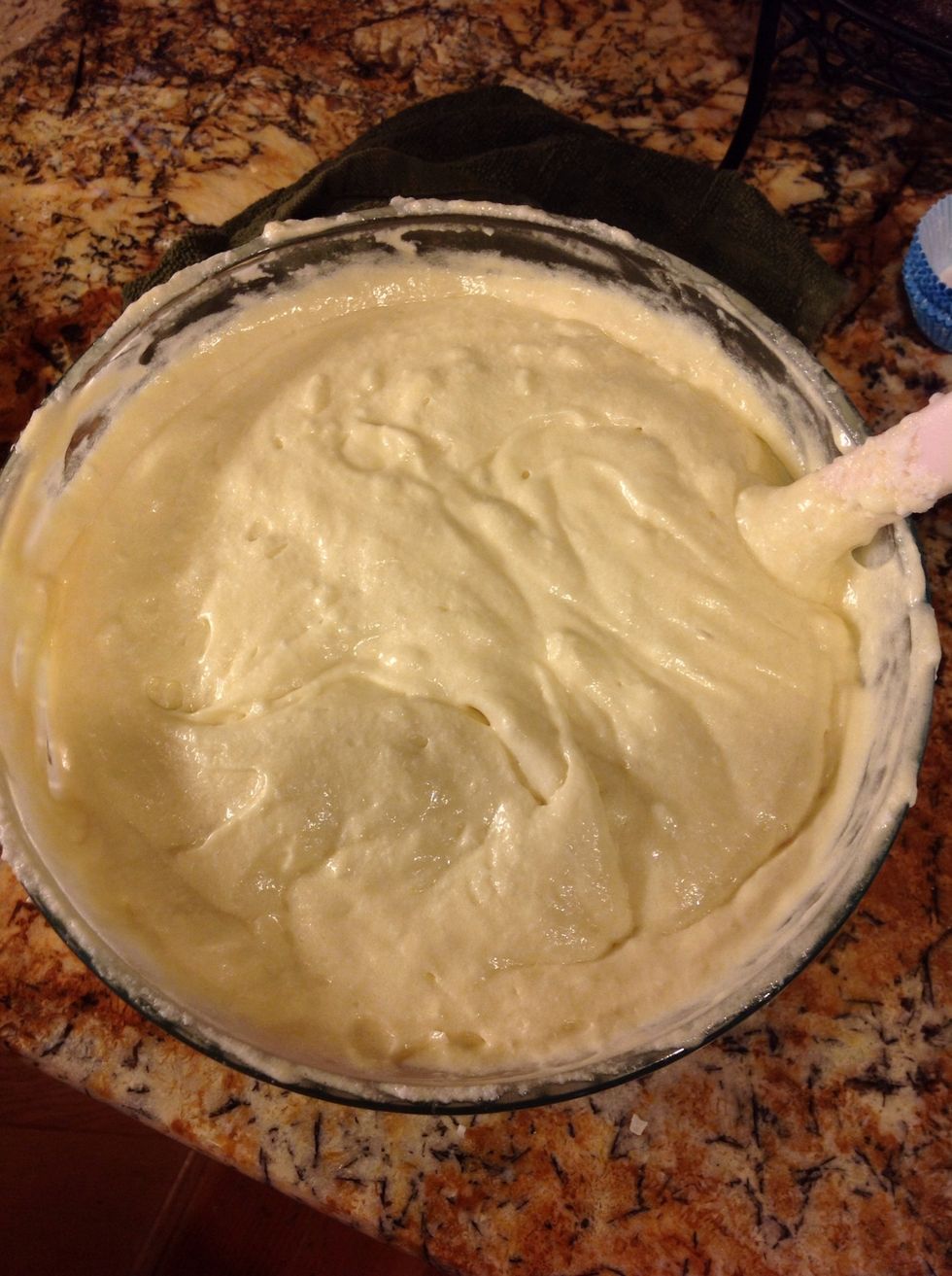 Gently fold in your egg whites, moving the spoon in a figure eight pattern until fully combined!