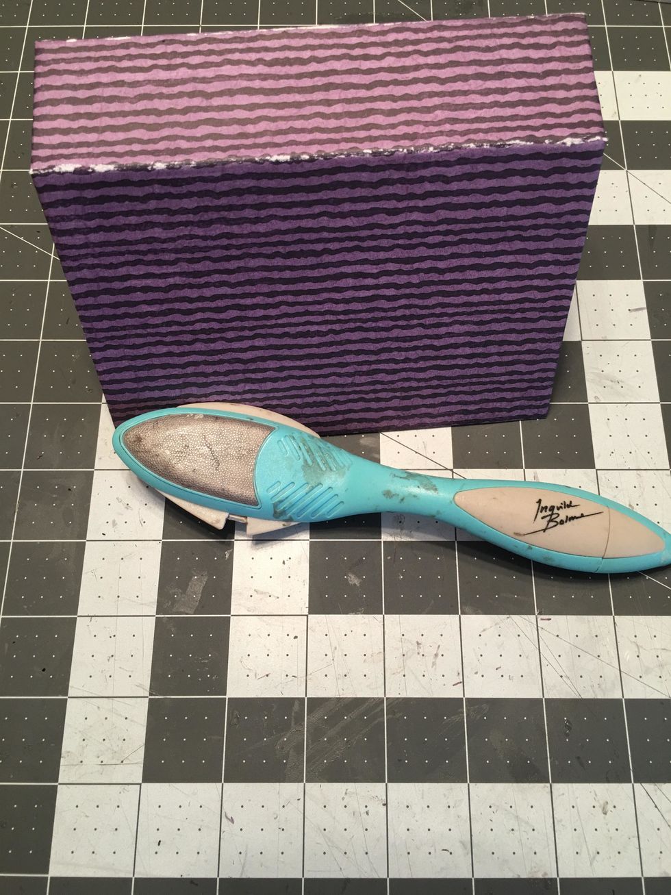 Gently fold the book closed.  If the spine area cracks on the outside, gently sand to give it a distressed look and ink with Black Soot Distress Ink.