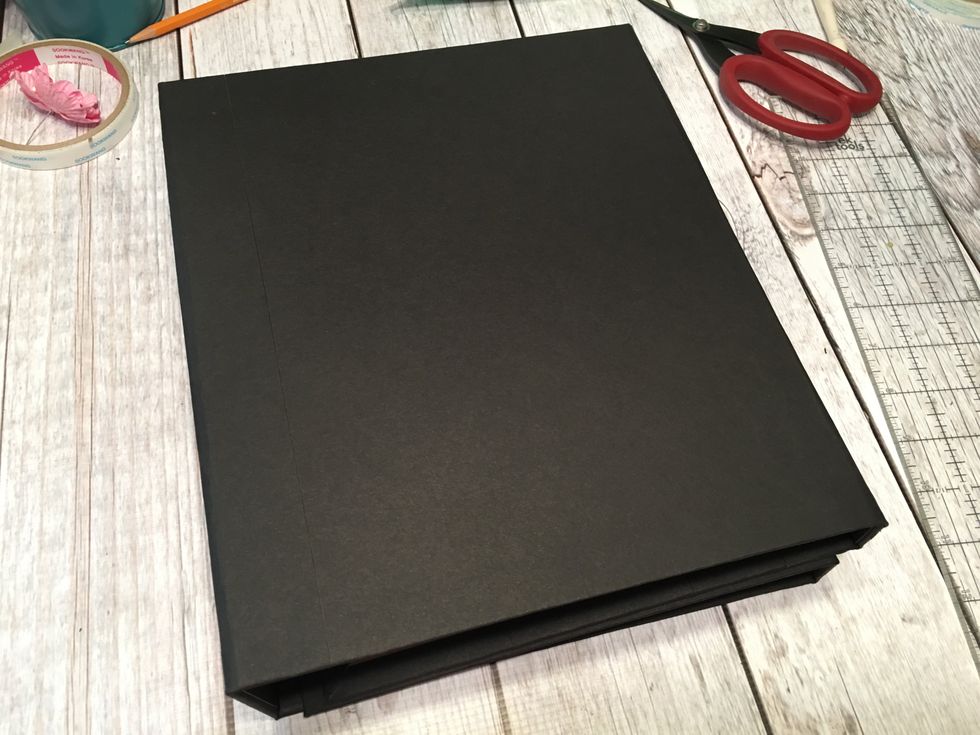 Gently fold up the sections of the folio.