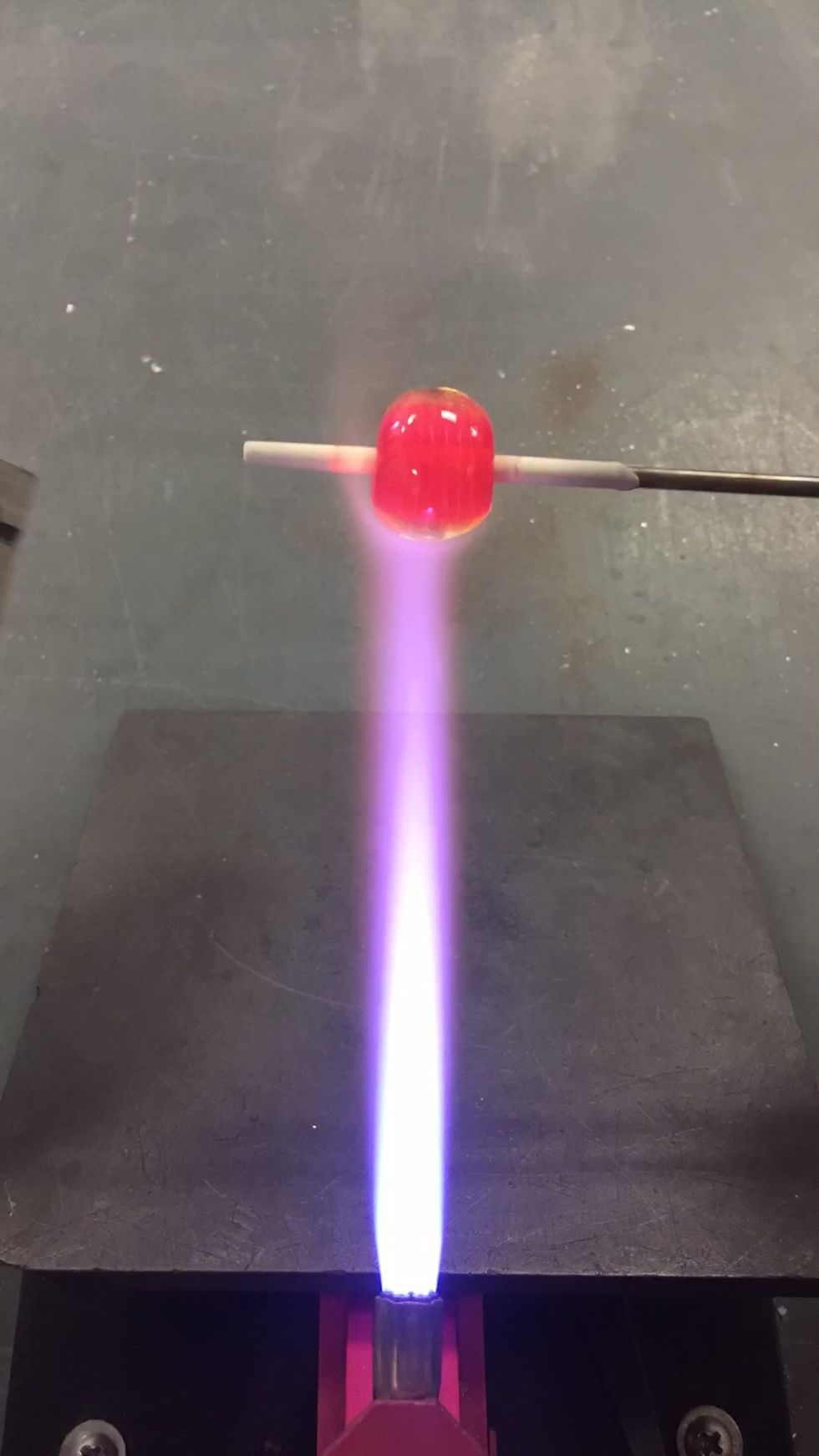 Gently heat the surface in preparation for final shaping.