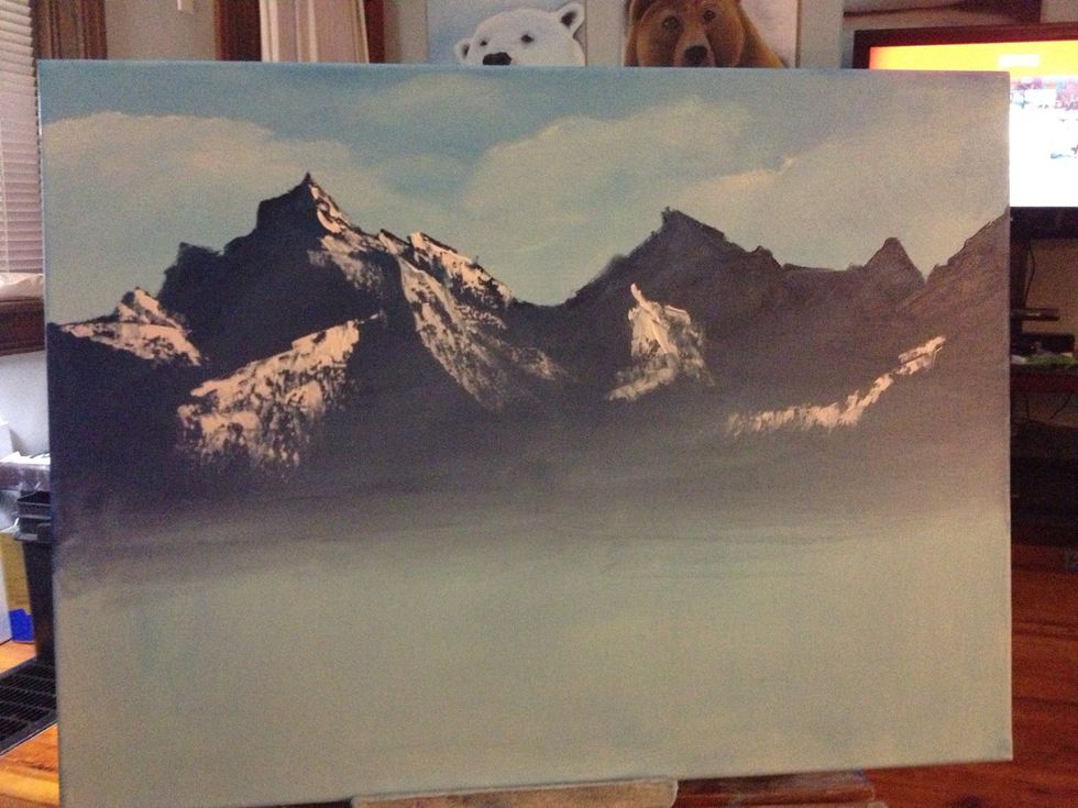 Gently lay the knife on the summit and let the teeth of the canvas take what it wants. DO NOT PUSH! Let the paint break as it wishes.