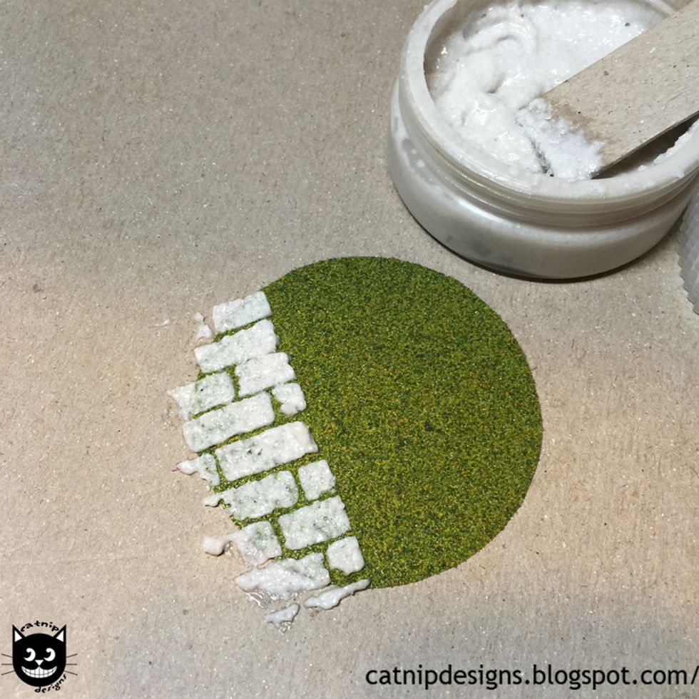 Gently lift the stencil and clean it. Allow the Texture Paste to dry.