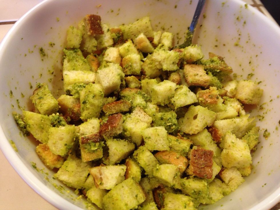 Gently mix until bread cubes are covered with pesto.